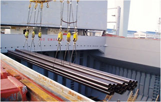 Loading of pipes using wire slings
